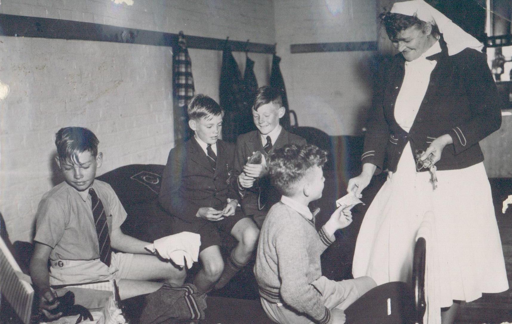 1950s-students-nurse-mud.jpg